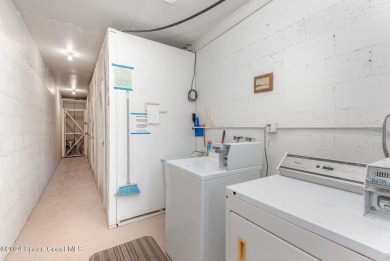 This beautiful 2 bedroom, 2 bath corner unit, ground-floor condo