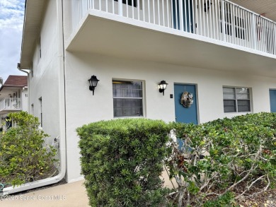 This beautiful 2 bedroom, 2 bath corner unit, ground-floor condo