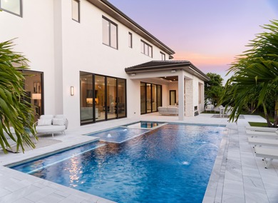 Balancing modern elegance with a true waterfront lifestyle, this