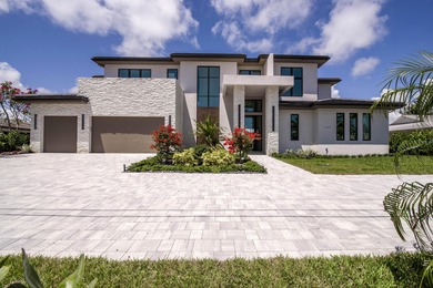 Balancing modern elegance with a true waterfront lifestyle, this