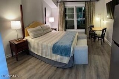 Fully furnished luxury condo with higher vaulted ceilings and