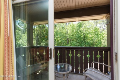 Fully furnished luxury condo with higher vaulted ceilings and