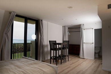 This spacious ocean end unit offers direct ocean views from its