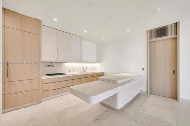 This unique two-bedroom, 2.5-bath residence spans over 2,500