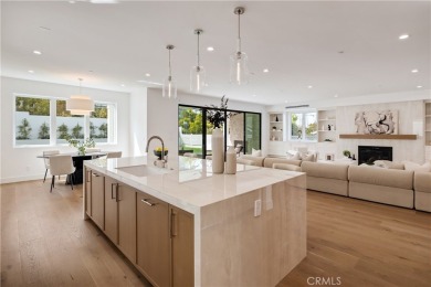 This stunning new construction home in Manhattan Beach offers 6
