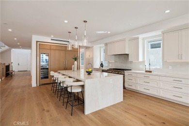 This stunning new construction home in Manhattan Beach offers 6