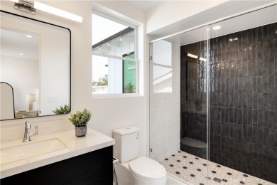 This stunning new construction home in Manhattan Beach offers 6