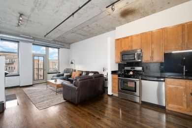 Welcome to this inviting 1-bedroom plus den condo in the vibrant