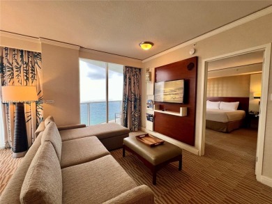 Enjoy ocean and Intracoastal views from this high-floor, large