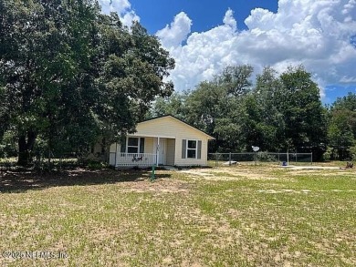 PRICE IMPROVEMENT! Charming 3-Bedroom Country Home on nearly an