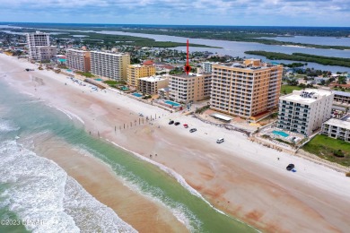 Experience the ultimate oceanfront living at the captivating