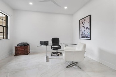 Live the ultimate country club lifestyle in this exquisitely