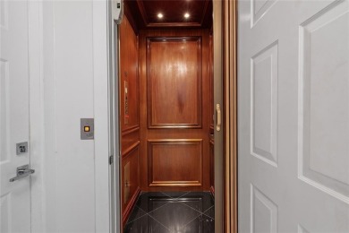 Live the ultimate country club lifestyle in this exquisitely