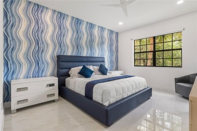 Live the ultimate country club lifestyle in this exquisitely