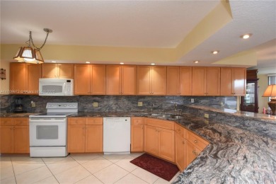 THIS SPACIOUS CONDO UNIT IS LIKE YOUR OWN PRIVATE HOME ON THE