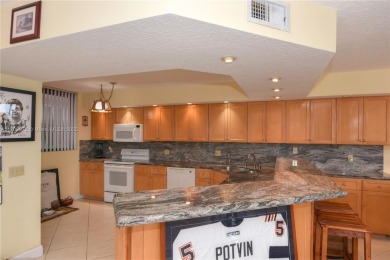 THIS SPACIOUS CONDO UNIT IS LIKE YOUR OWN PRIVATE HOME ON THE