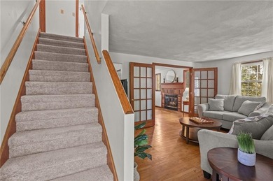 Nestled in the desirable Warwick Neck community, this inviting
