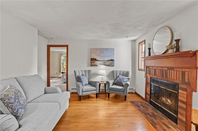 Nestled in the desirable Warwick Neck community, this inviting