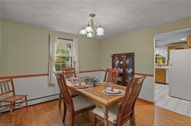 Nestled in the desirable Warwick Neck community, this inviting