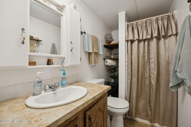 Affordable Canal-Front Living Near Dunns Creek-Discover the