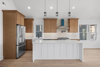 Incredible NEW CONSTRUCTION condo located just a short walk from