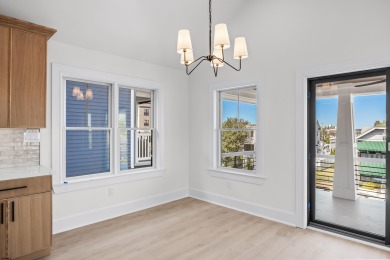 Incredible NEW CONSTRUCTION condo located just a short walk from