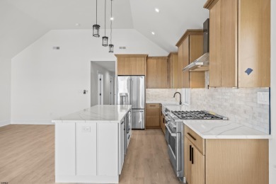 Incredible NEW CONSTRUCTION condo located just a short walk from