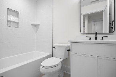 Incredible NEW CONSTRUCTION condo located just a short walk from