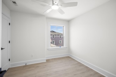 Incredible NEW CONSTRUCTION condo located just a short walk from