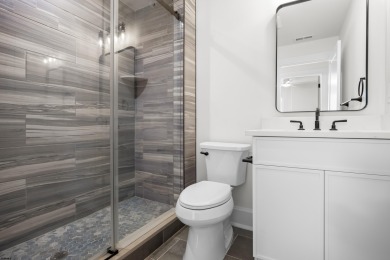 Incredible NEW CONSTRUCTION condo located just a short walk from