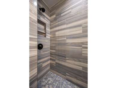 Incredible NEW CONSTRUCTION condo located just a short walk from