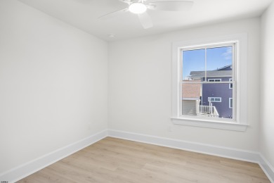 Incredible NEW CONSTRUCTION condo located just a short walk from