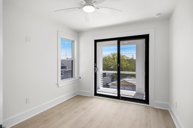 Incredible NEW CONSTRUCTION condo located just a short walk from