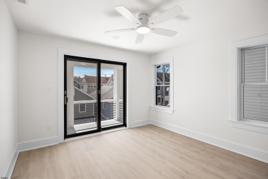 Incredible NEW CONSTRUCTION condo located just a short walk from