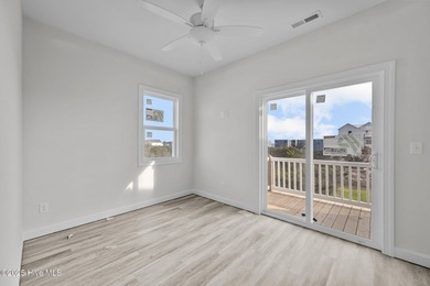$10,000 USE AS YOU CHOOSE - MOVE-IN READY BEACH RETREAT! For