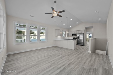 $10,000 USE AS YOU CHOOSE - MOVE-IN READY BEACH RETREAT! For