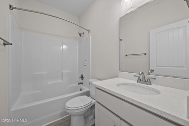 $10,000 USE AS YOU CHOOSE - MOVE-IN READY BEACH RETREAT! For