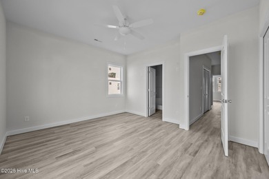 $10,000 USE AS YOU CHOOSE - MOVE-IN READY BEACH RETREAT! For