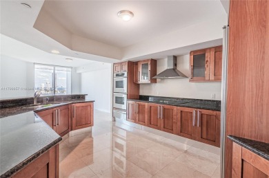 Discover luxurious living in this exquisite 3-bedroom plus den