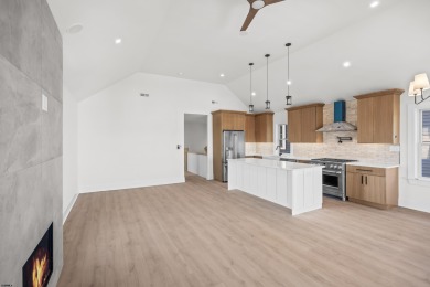 Incredible NEW CONSTRUCTION condo located just a short walk from