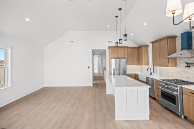 Incredible NEW CONSTRUCTION condo located just a short walk from