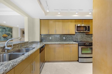 Middle floor Harbour House unit with Marina, bay and Ocean views