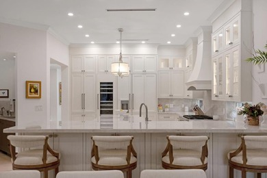 This stunning Mediterranean-style waterfront residence in the