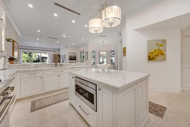 This stunning Mediterranean-style waterfront residence in the