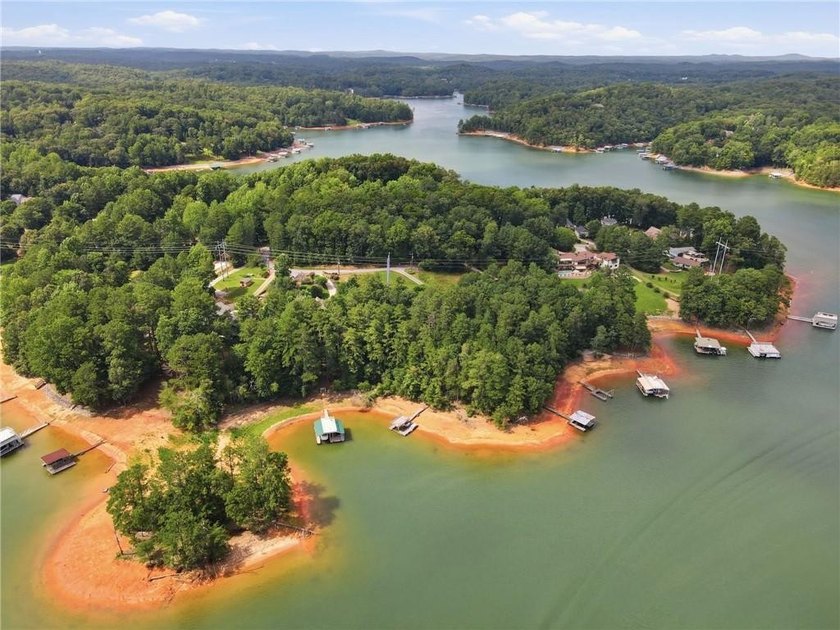 Build your dream lake home on this exceptional waterfront lot in - photo 12