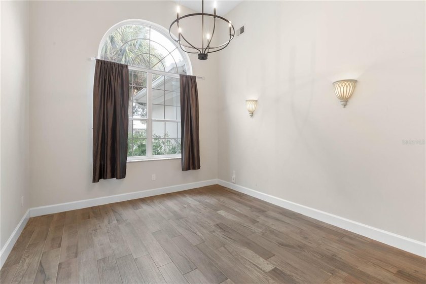 Virtually Staged. Nestled within the prestigious, guard-gated - photo 17
