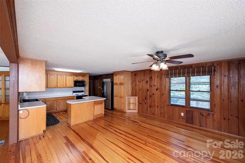 Welcome to this 4-bedroom, 3-bathroom waterfront retreat on the - photo 4