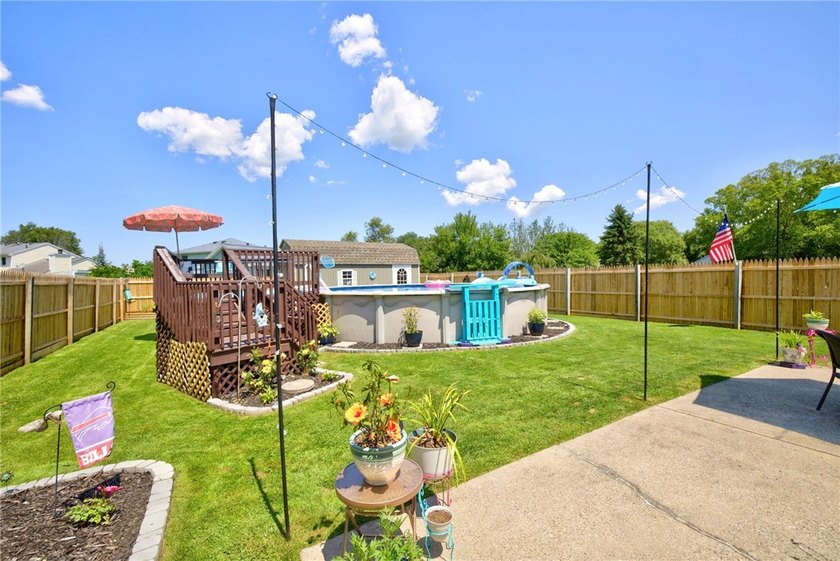 Welcome to this beautifully maintained raised ranch nestled on - photo 8