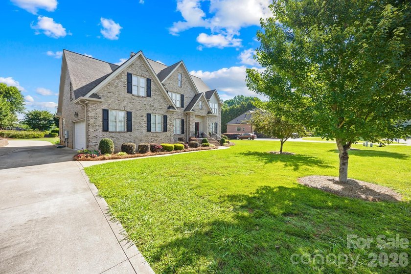 Welcome home to this stunning, all-brick custom-built residence - photo 3