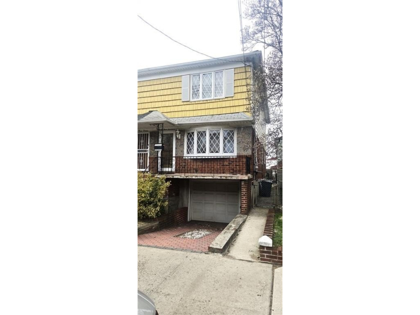 Right off exit 13 from Belt Parkway, this Semi-Detached Single - photo 2